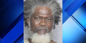 A Dania Beach man has been jailed after a 'decomposing' pit bull was discovered tethered to a lawn mower, according to authorities