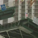 Police Woman injured after falling from the Brickell Avenue Bridge; cop injured while rescuing her