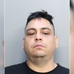 Police say an alleged trafficker kept a cocaine stash in a Miami Beach condominium with his 3-year-old son