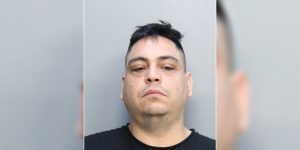 Police say an alleged trafficker kept a cocaine stash in a Miami Beach condominium with his 3-year-old son