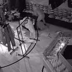 Surveillance footage shows burglars ransacking trendy Kendall shoe shop in seconds