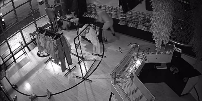 Surveillance footage shows burglars ransacking trendy Kendall shoe shop in seconds