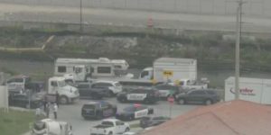 The FBI and FDLE are investigating a robbery and a police shooting that injured two people after a pursuit ended in Medley, according to authorities