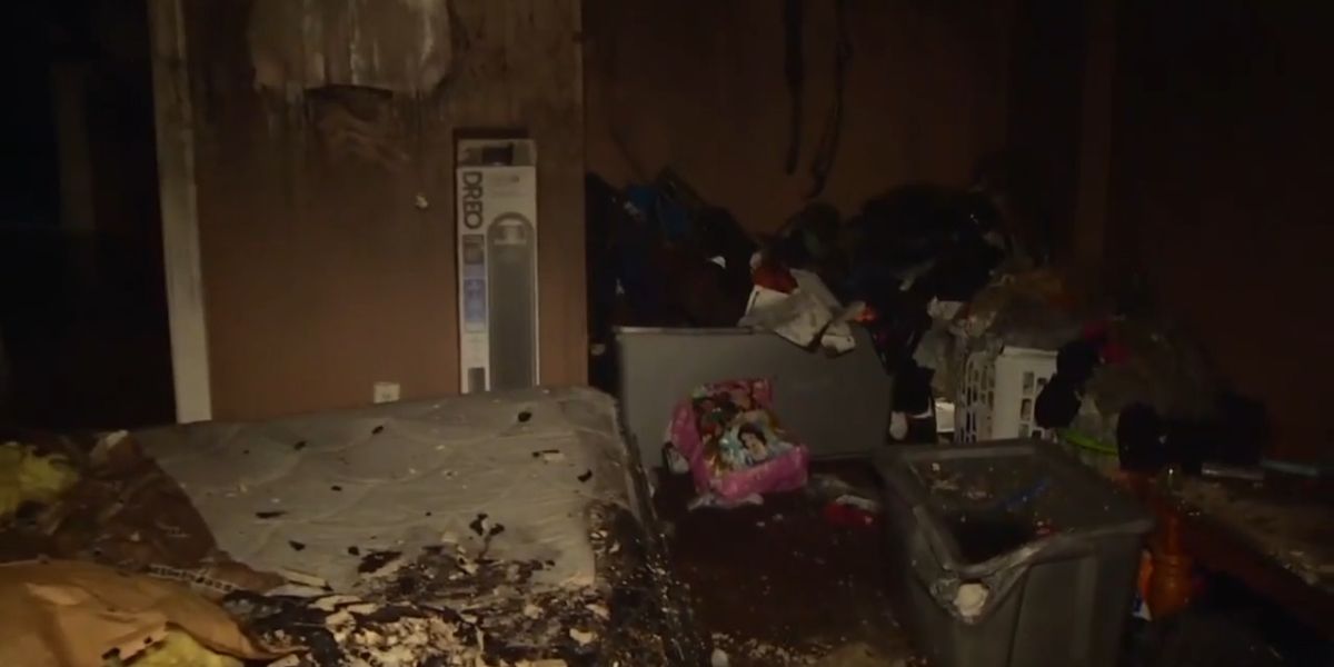 Two people have been relocated, and a cat has been rescued after a residence in Northwest Miami-Dade catches fire